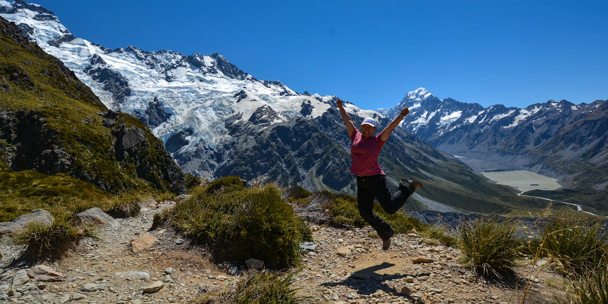 A guest excited to be hiking in Aoraki/Mt Cook National Park